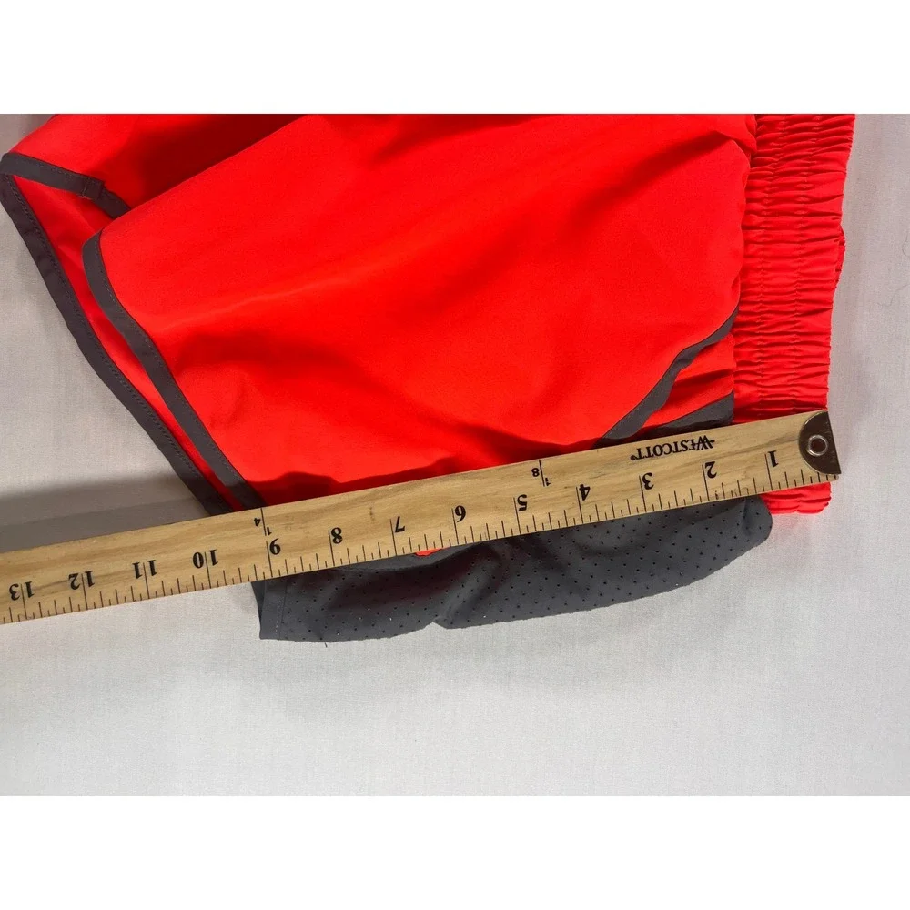 Under Armour Womens XS HeatGear Athletic Shorts Bundle Neon Orange Blue 2pk